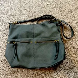 Purse tote bag. No brand. Gently used. Has functional zippers and 8 pockets.
